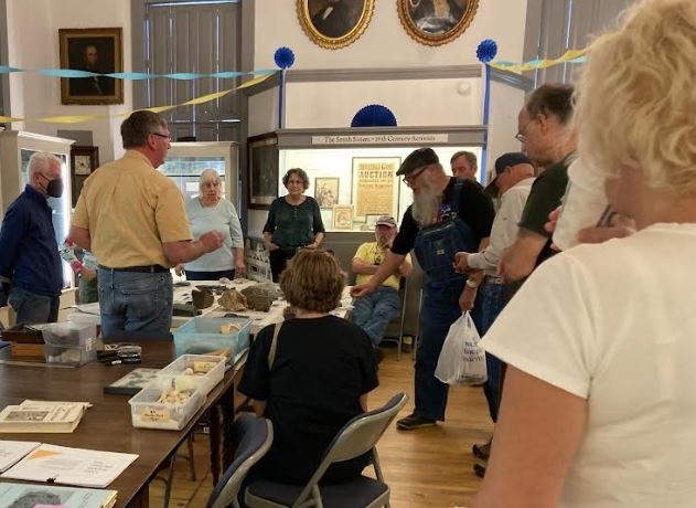 Left to right: Jim Trocchi, Tom Ford, Nancy Najarian, Paula Morris Gary Nolf, (background) Jim Wicks, John Desjardins (reaching), Jeff Zaino, Lee West, Maryanne Avery, (seated, foreground) Joan Hill.